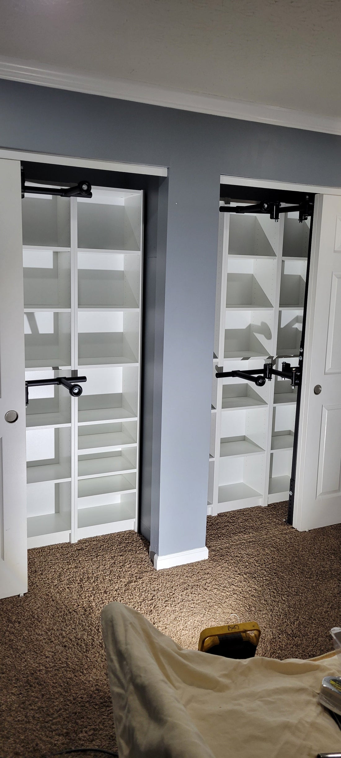 Image showcasing a retirement community closet using Be Clever Closet Rod System, demonstrating easy access and organized storage.